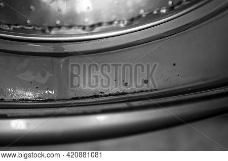 Front Loading Washing Machine With Mold Growing On Door Gasket