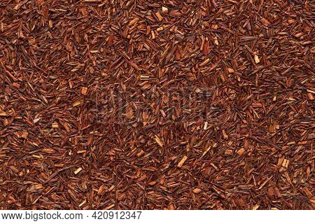 Rooibos Tea Texture Close Up. Dry Redbush Healthy Tea, Top View.