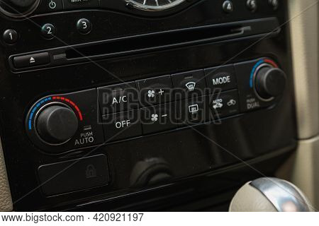 Novosibirsk, Russia - May 16, 2021: Infiniti Qx, Close Up Of  Car Panel With The Air Conditioning Bu