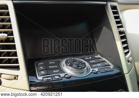 Novosibirsk, Russia - May 16, 2021: Infiniti Qx, Close Up Shot Of Modern Central Console With Naviga