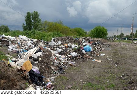 Spring landscape.Ecology of Ukraine. Nature near Ukrainian capital. Environmental contamination. Illegal junk dump.May 18,2021. Kiev , Ukraine