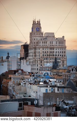 MADRID, SPAIN - MAY 13, 2018: Telefonica Building rise above historical buildings on Gran Via business district.