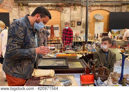 Lviv, Ukraine - May 16, 2021 : People Wearing Face Masks Shopping On Garage Sale In Lem Station, Tlu