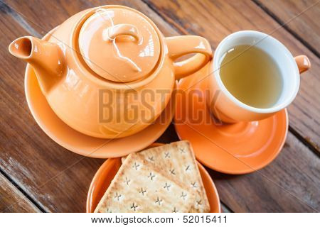 Hot Teapot With Cup And Crackers