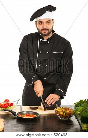 Chef Man Cutting Eggplant