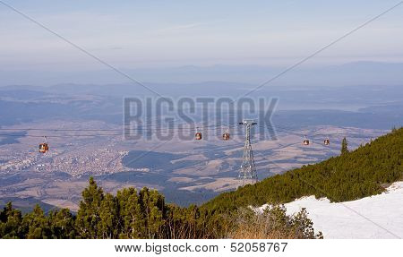 Cable Car Ski Lift Over Mountain Landscape