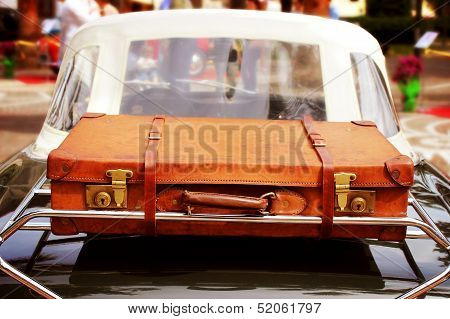 Vintage Car with Leather Suitcase