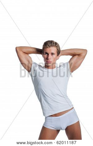 Beefy guy advertises underwear, isolated on white