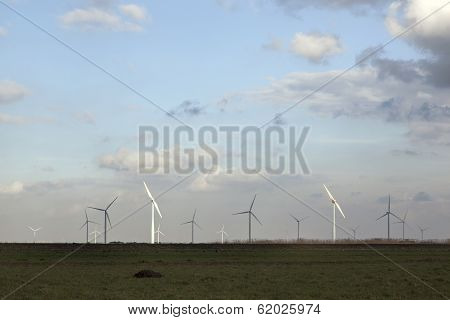 Wind Turbines And Blue Sky With Clouds