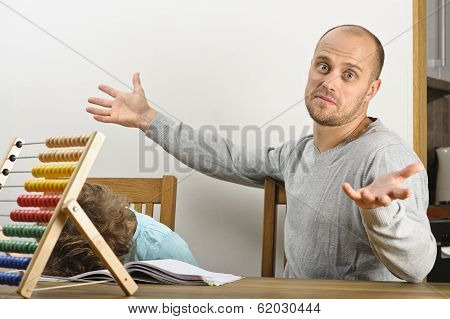 father helping his son with homework