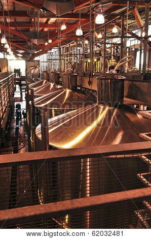 Wine making vats and equipment in tour of winery