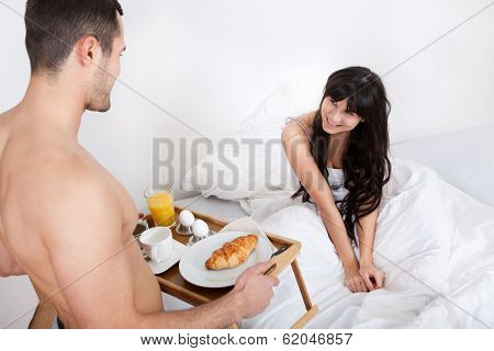 Man Bringing Breakfast To His Wife