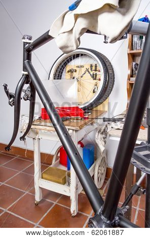 Custom fixie bike parts in a restoration process