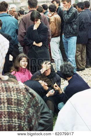 MALI ZVONIK, BOSNIA - MAR 19: A funeral for five Bosnian Serb men killed the night before by Bosnian Muslim troops near in Mali Zvornik, Bosnia, on March 19, 1992.