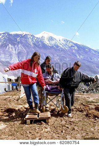 KUKES, ALBANIA, 17 APRIL 1999 -  Kosovar Albanians make their way into a refugee camp along the Albanian border. The Kosovo war of independence has created a refugee crisis.