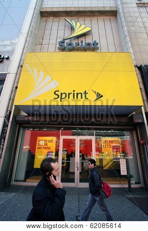 NEW YORK CITY - APRIL 19: People walk past a Sprint mobile telecommunications retail outlet  in New York City, on Friday, April 19, 2013.