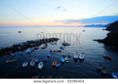 RIOMAGGIORE - ITALY: AUG 17: Boats in the marina in Riomaggiore, Italy, on Sunday, August 17, 2013. The village is one of five making up Cinque Terre. 