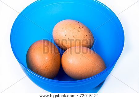 Group Of Eggs In Blue Bowl
