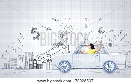 Young woman riding car made of list of paper
