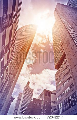 several office towers and buildings in the sun seen from below, Frankfurt am Main, Germany