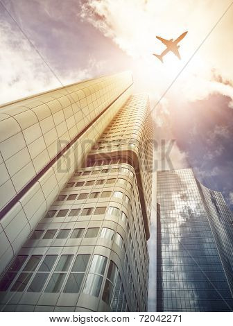 plane flying over office skyscrapers, Frankfurt am Main, Germany