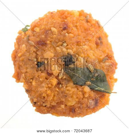 Crispy deep fired vadai snack, very common street food in the Indian Subcontinent and Sri Lanka, shoot isolated on white background.