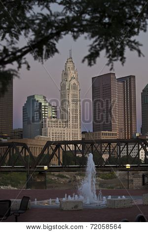 Twilight view of Columbus, Ohio featuring the historic Leveque Tower.