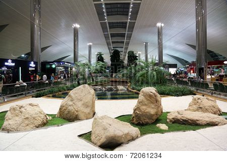 DUBAI - FEB 18: Recreation area in International airport on February 18, 2012 in Dubai, UAE. The airport is major aviation hub in the Middle East with max throughput of 80 millions passengers per year
