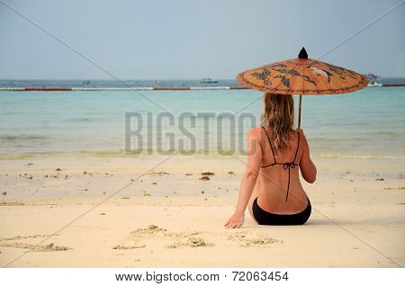 Woman Resting On The Beach