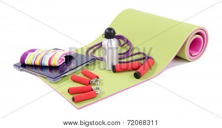 Sport requisites on a carpet isolated on white