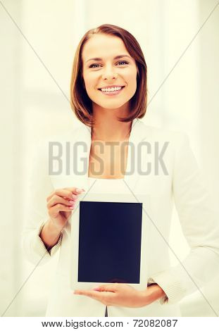 office, business, technology and internet concept - businesswoman with tablet pc in office