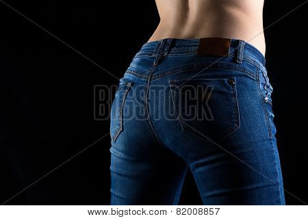 Photo of woman's buttocks in jeans