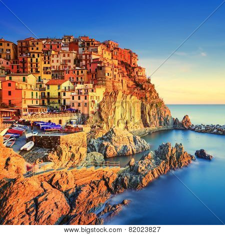Manarola Village, Rocks And Sea At Sunset. Cinque Terre, Italy