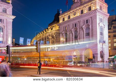 LONDON, UK - AUGUST 22, 2014: Piccadilly Circus in night. Famous place for romantic dates. Square w