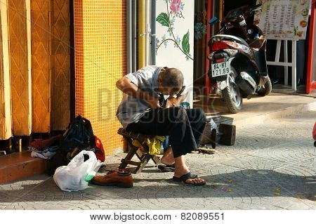 Senior Vietnamese Man, Repair Shoes