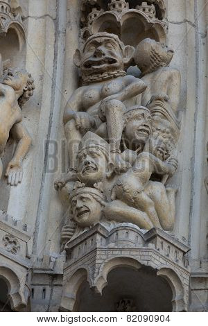 Paris - West facade of Notre Dame Cathedral. Archivolts of The Last Judgment portal