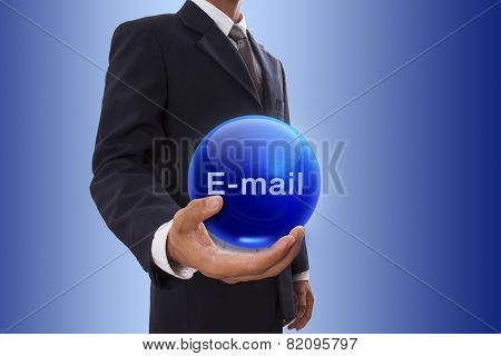 Businessman hand holding blue crystal ball