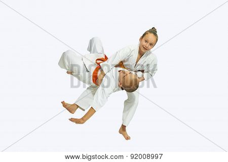 Girl is throwing boy sporting throw