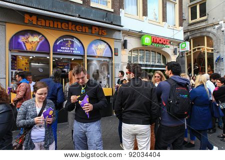 Dutch fries street shop with people