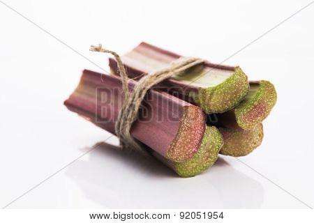 Bunch Of Fresh Rhubarb Isolated On White Background