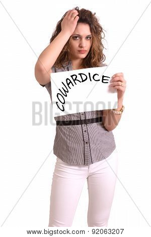 Uncomfortable Woman Holding Paper With Cowardice Text