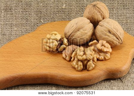 Walnuts On A Wooden Board (cutting Board)
