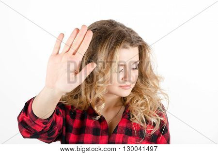 Young Woman Showing Sign No Or Stop With Her Hand