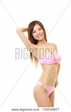 Japanese woman posing in a pink bikini