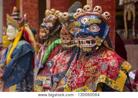 LAMAYURU INDIA - JUNE 13 2015: An unidentified buddhist lamas dressed in mystical mask dancing Tsam mystery dance in time of Yuru Kabgyat Buddhist festival at Lamayuru Gompa Ladakh North India