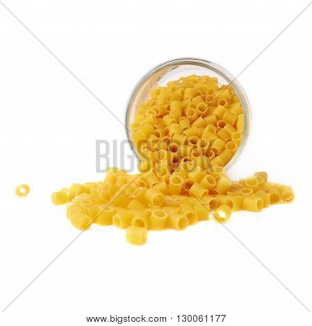 Glass jar filled with dry ditalini yellow pasta over isolated white background