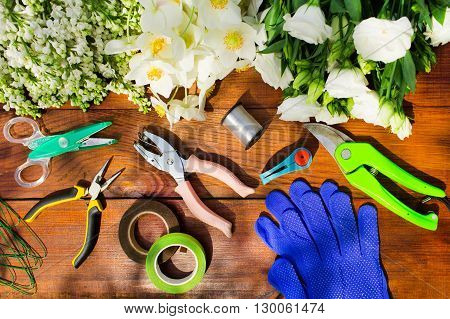 Garden Tools, Tools For Floristics And Flowers On A Wooden Table.