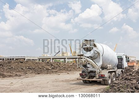 Mixer truck is transport cement to the casting place on building site.