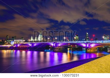 Blackfriars bridge at night in London UK.