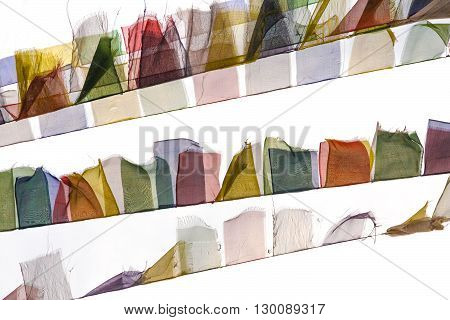 Buddhist prayer flags fluttering on the wind